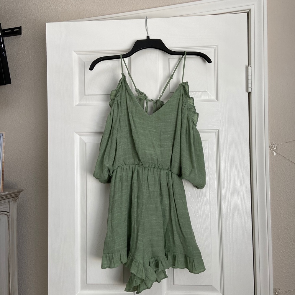 Green comfortable romper. Never worn :)